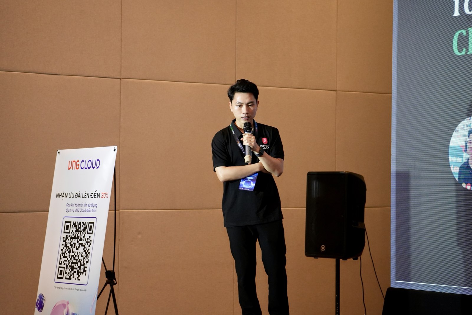 On stage at OpenInfra & Cloud Native Day Vietnam 2025